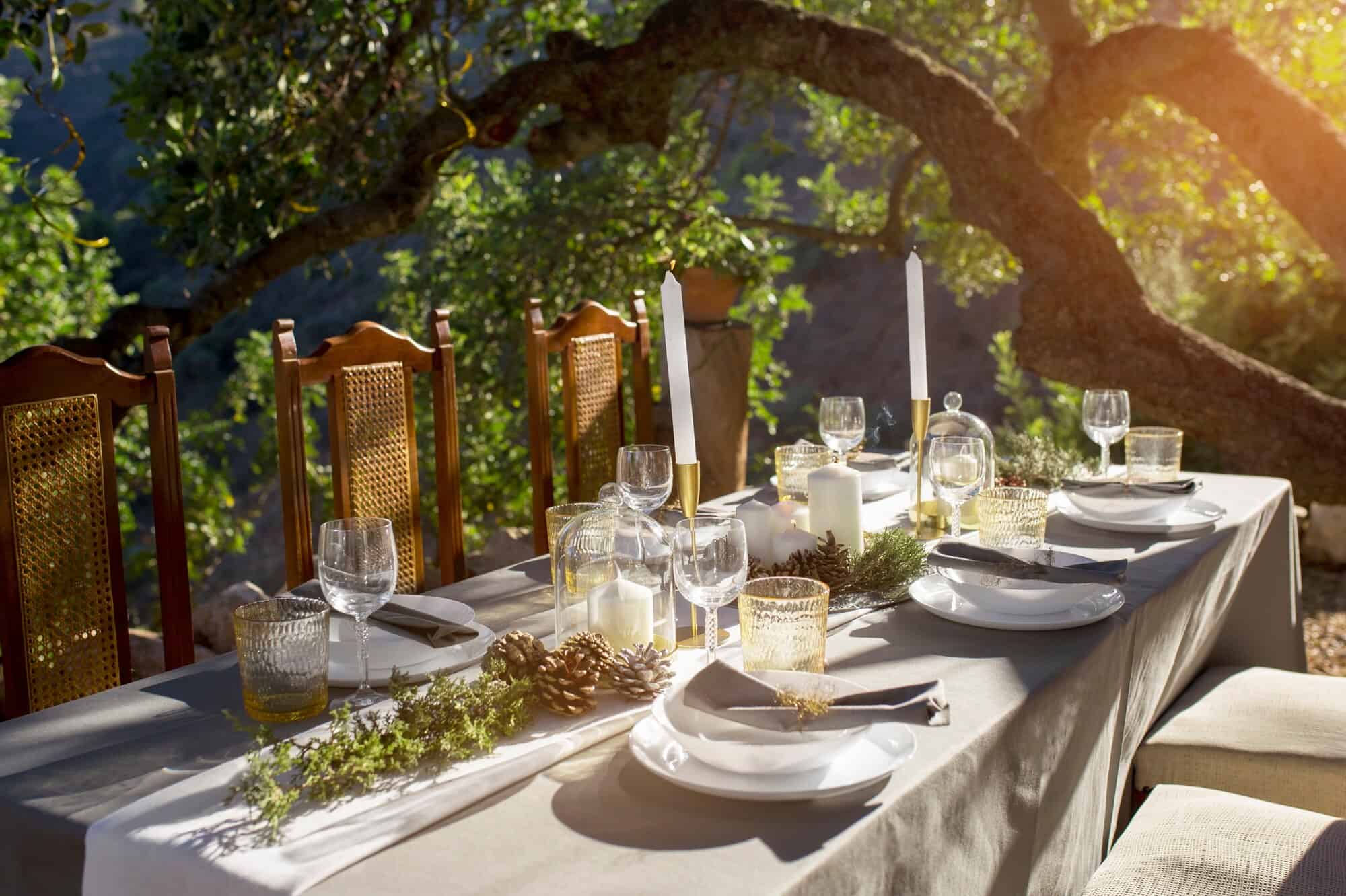 Elegant outdoor dining setup with candles