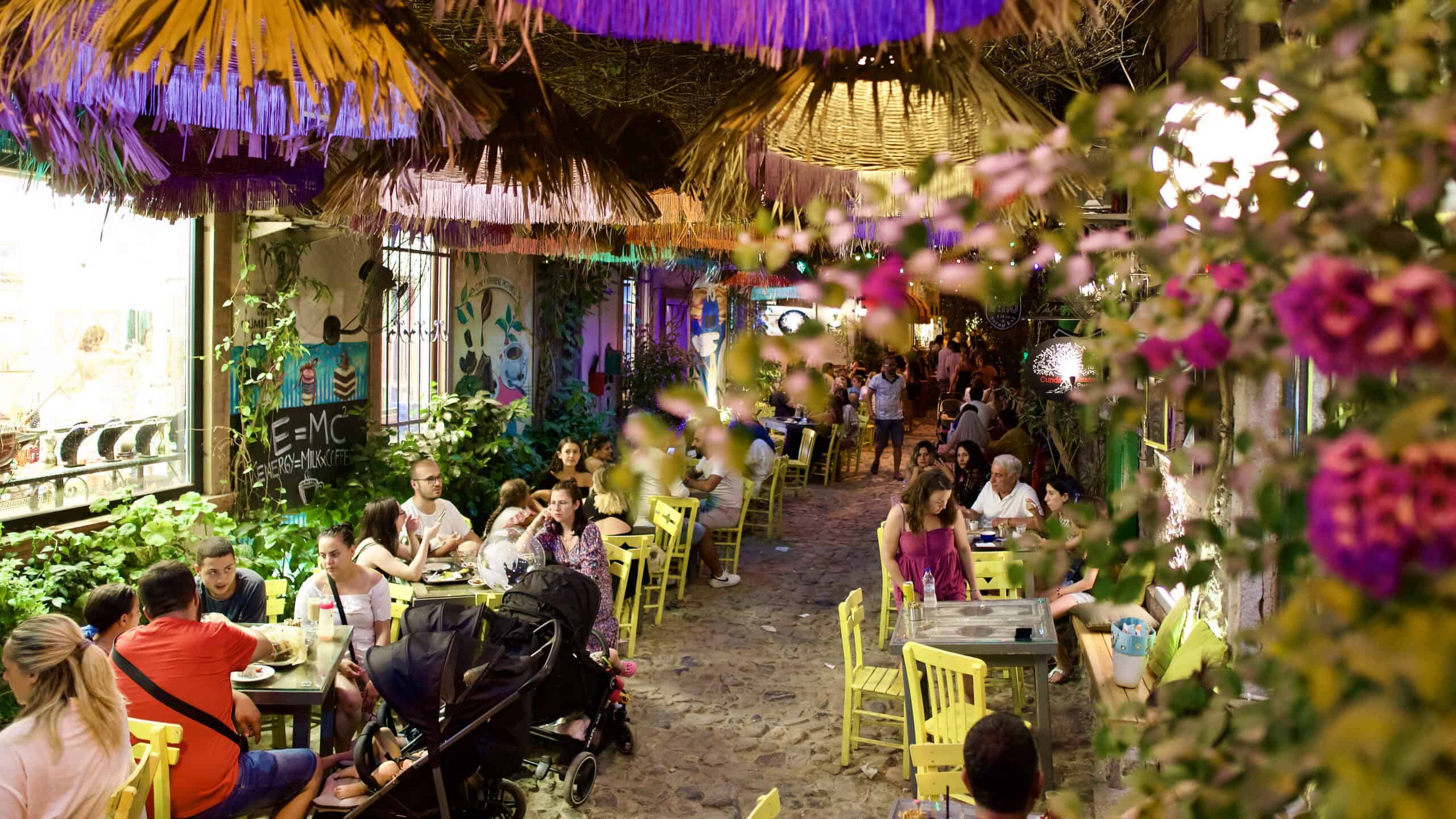 Colorful outdoor restaurant with diners
