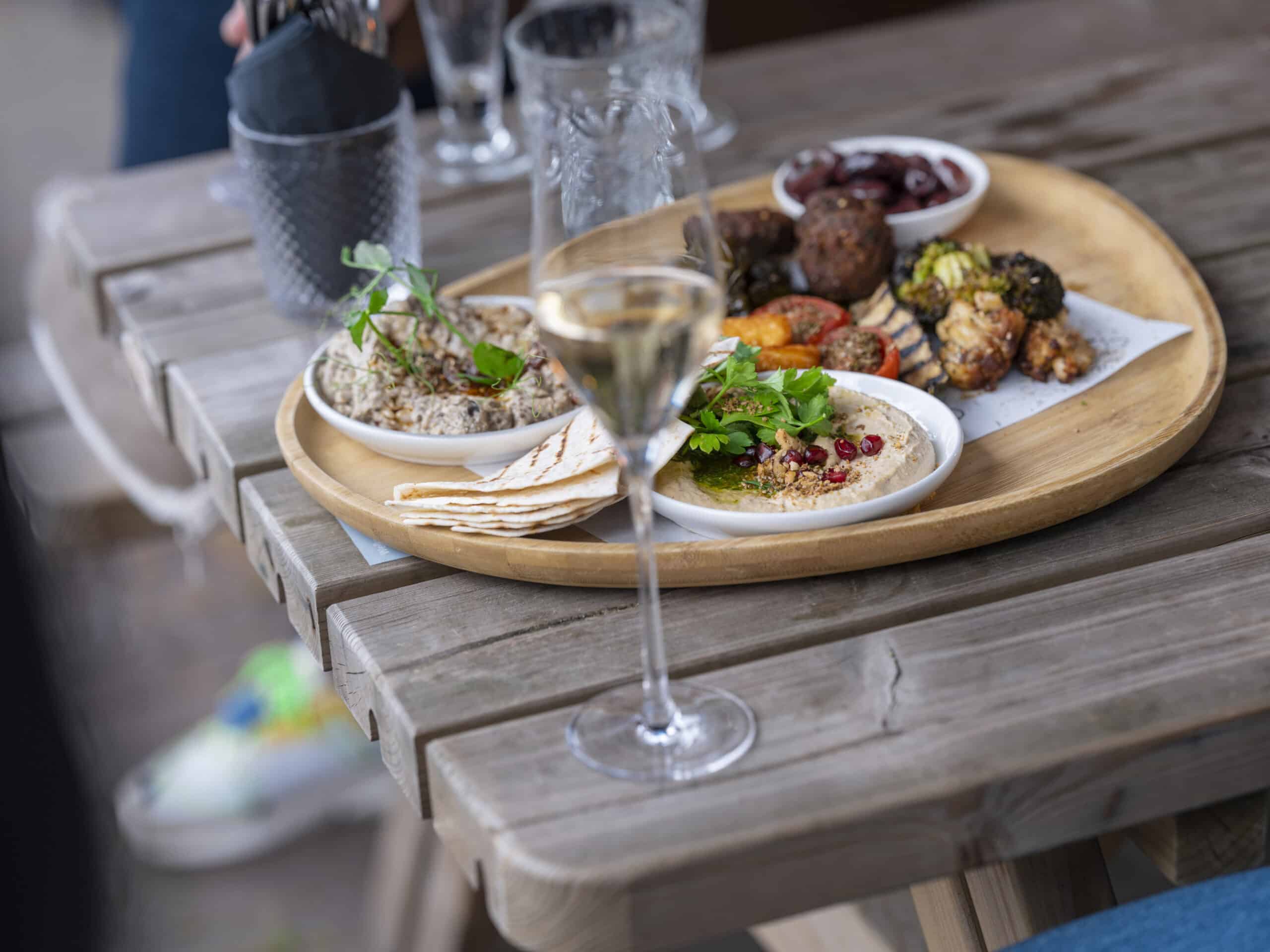 Appetizing platter with drinks and snacks