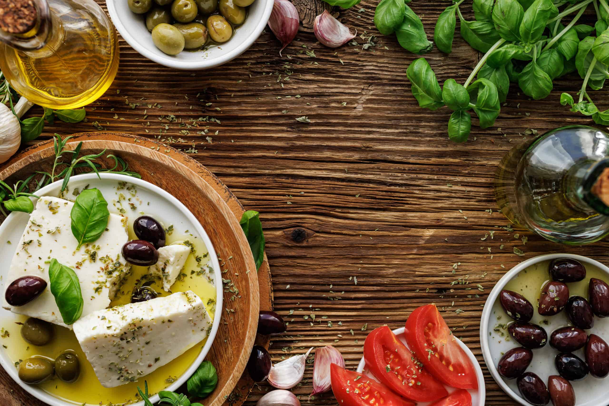 Mediterranean ingredients on wooden table